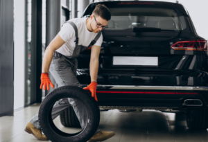 a mechanic changing tires