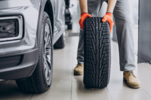 a mechanic changing tires