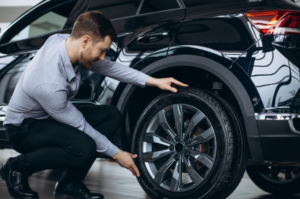 a man checking tires